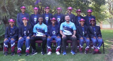 Cricket team in a team photo.