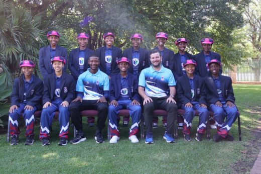 Cricket team in a team photo.