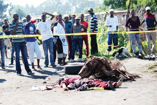 Angry and unruly residents of Joko Tea informal squatter camp stoned a murder suspect to death over the weeked. The community is also said to have charged at the police and ambulance personnel. Photo: Lazarus Dithagiso