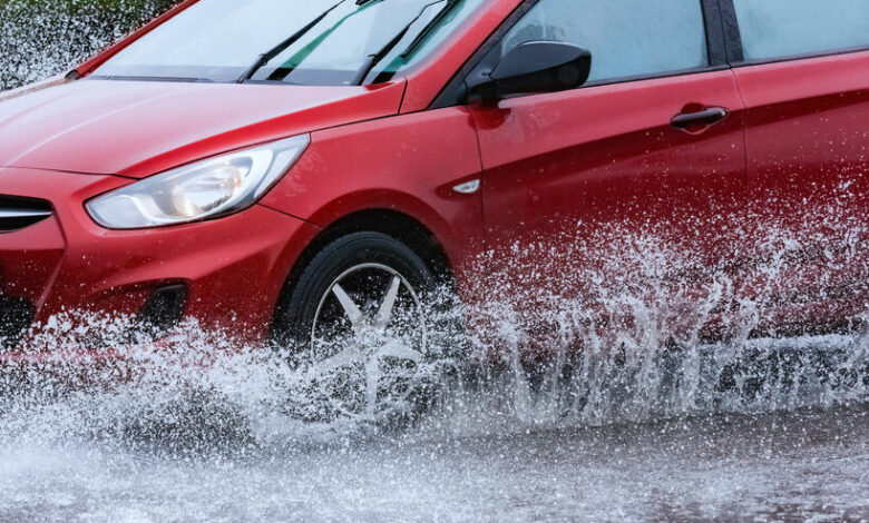car rain puddle splashing water