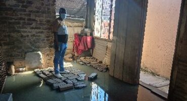 Zone 10 resident Ntshebeng Mofokeng says his yard is drenched in sewer, causing him and his family members constant health problems. Photo: Moleboheng Chaha