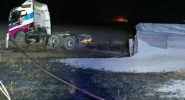 A crash between a light motor vehicle and a truck.