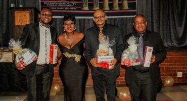 Teachers proudly receive awards at the Sebokeng Teachers Awards ceremony.
