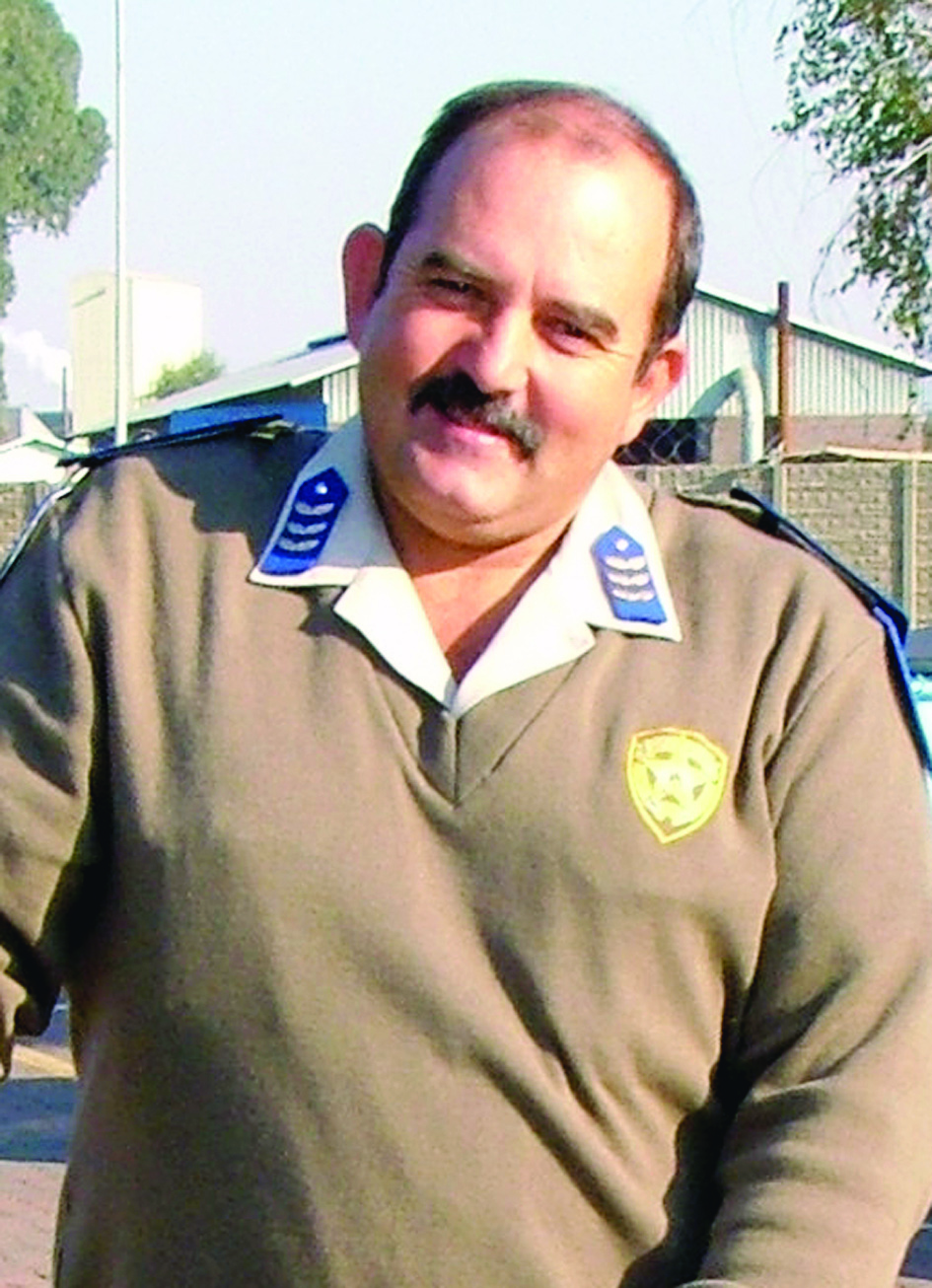 Mnr. Malcolm Grimbeek, hoof van verkeer.