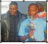 Kagiso Rakoma was invited to join the SA U/17 national team assessment camp held in Johannesburg recently. The former Bafana Bafana captain Aaron “Mbazo” Mokoena (left) and SA u/20 national team coach Thabo Senong congratulated Rakoma after he was named Youth Player Of The Tournament. Photo: Zacharia Nale.