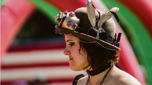 Interesting happenings attracks interesting people. This young lady in her steampunk attire caught the eye.