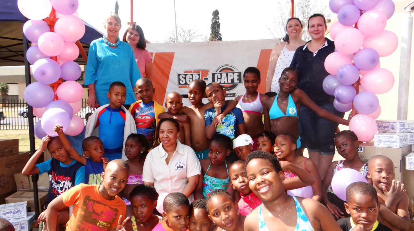 Learners and personnel of Ed-U-College with the headmaster Ceri Kleynjan (back left), gathered food, clothing and groceries for Hands of Hope, a charity organisation helping the poor and less privileged.