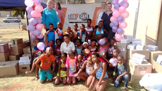 Learners and personnel of Ed-U-College with the headmaster Ceri Kleynjan (back left), gathered food, clothing and groceries for Hands of Hope, a charity organisation helping the poor and less privileged.