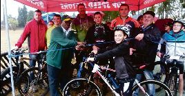 MMC Chaka Radebe cutting the ribbon to open the track.