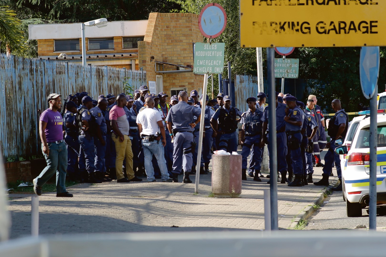 Two people arrested for defeating the ends of justice on Monday afternoon in Vanderbijlpark. They were charged with damage to property, assault of police officers, intimidation and unlawful protest. Photo: Mduduzi Mathebula