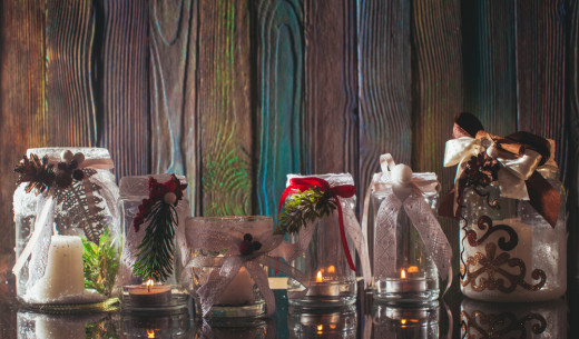 #2 Snowflake Lanterns - Give your glass jars a new look and a new lease on life. Bright ribbons, tea light candles and carefully cut decorations will leave your jars glowing. You could also consider using paint to get the look you need. Spread them throughout your home, along with some Christmas cheer.