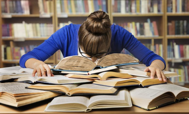 Student Studying Hard Exam, Sleeping on Books Read in Library