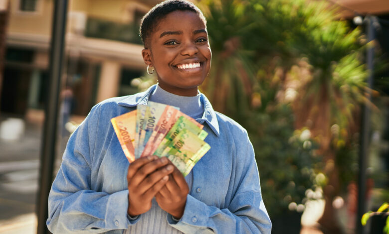 Young,African,American,Woman,Smiling,Happy,Holding,South,Africa,Rand