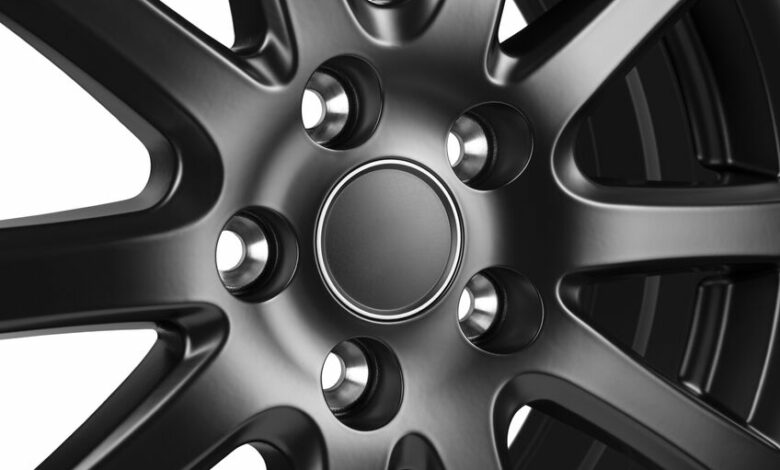 Car Wheel discs. Car wheel Rim black color matt isolated on whit