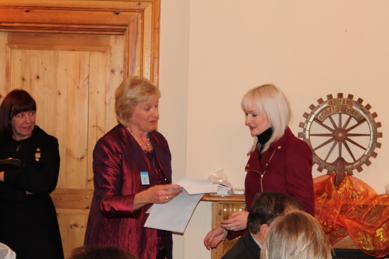 Outgoing president of Nigel Rotary Anns Bianca Scott (on the right) was awarded a certificate of merit for her outstanding contribution the past year. The certificate was handed over by Margie Grant.