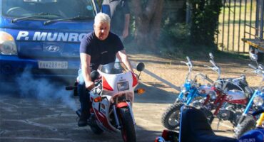 A man riding a motorcycle.