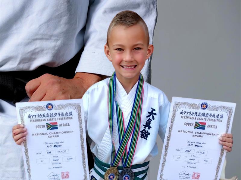 AC het ’n goue ’n silwer medalje huis toe gebring.