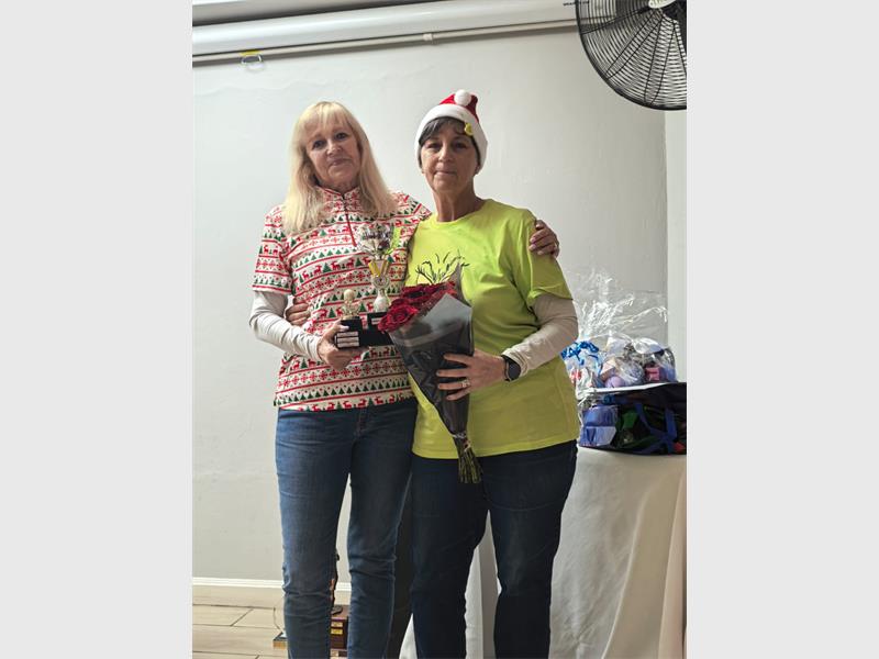 ESWG president receives recognition during an emotional year-end event marked by gratitude, growth and personal loss.