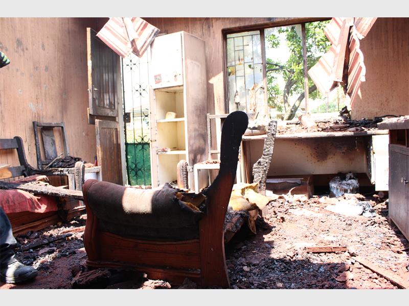 A Dunnottar family is pleading for assistance after a late-night candle fire destroyed their home, leaving eight people, including a grandmother and child with nothing.