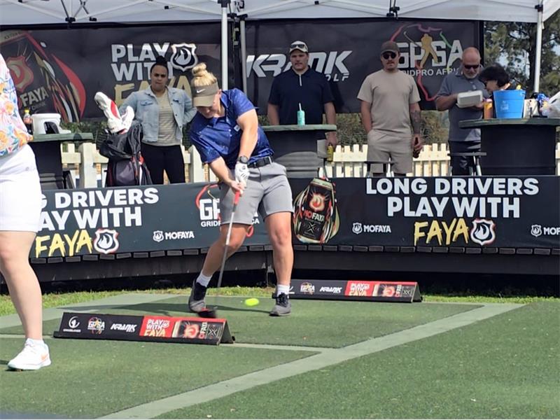 Nigel farmer and rising golf star, Marlene Botha, took second place at the National Longest Drive Championship with a powerful 292.1m shot.