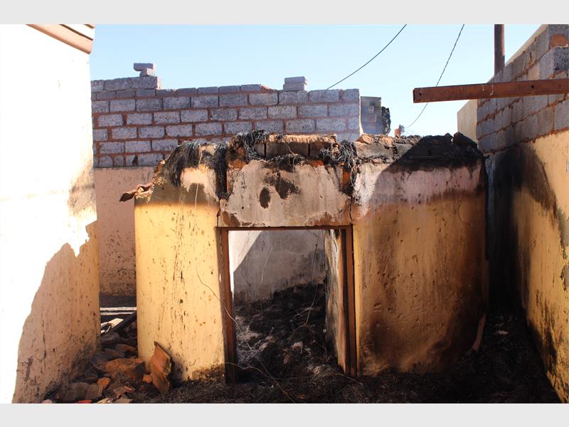 The Gauteng government has condemned the torching of Lesedi Executive Mayor Mluleki Nkosi's home during violent protests in Ratanda, while police have arrested 15 suspects linked to the unrest. Authorities say water supply has been restored, but residents may have to wait several days for reservoirs to refill and normal service to resume.