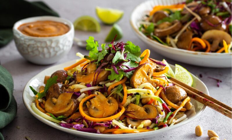 Raw Pad Thai with spicy sautéed mushrooms