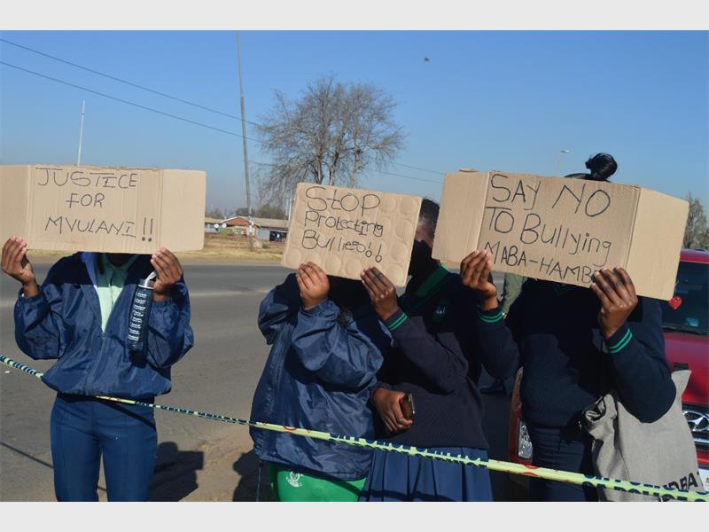 Gauteng education confirms Thuto-Lesedi Secondary School principal was transferred to the district office pending investigation, as four learners are suspended and one faces attempted murder charges.