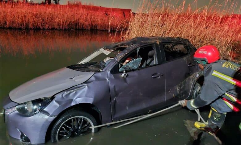 Emergency services recovered a submerged Mazda sedan on the R550, with all six occupants declared dead at the scene.