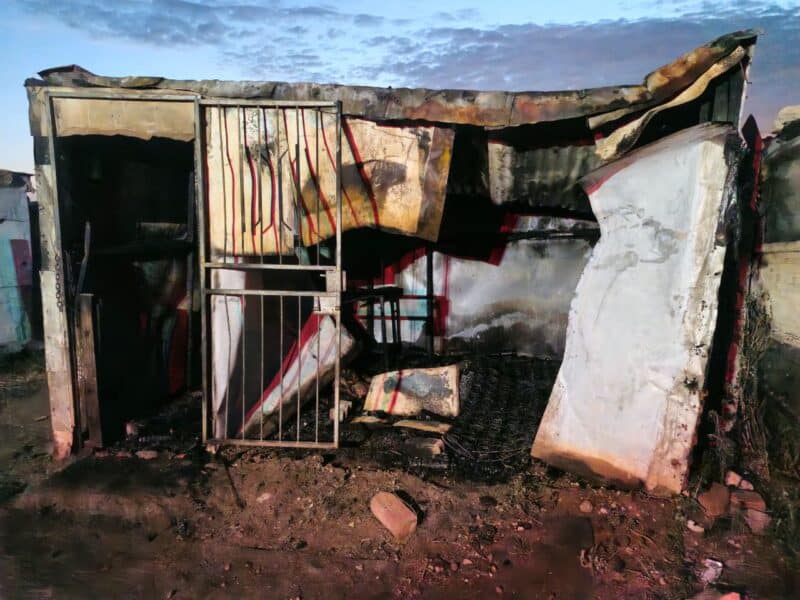 Firefighters discovered the charred remains of an unknown man after extinguishing a shack blaze in Mandela informal settlement.