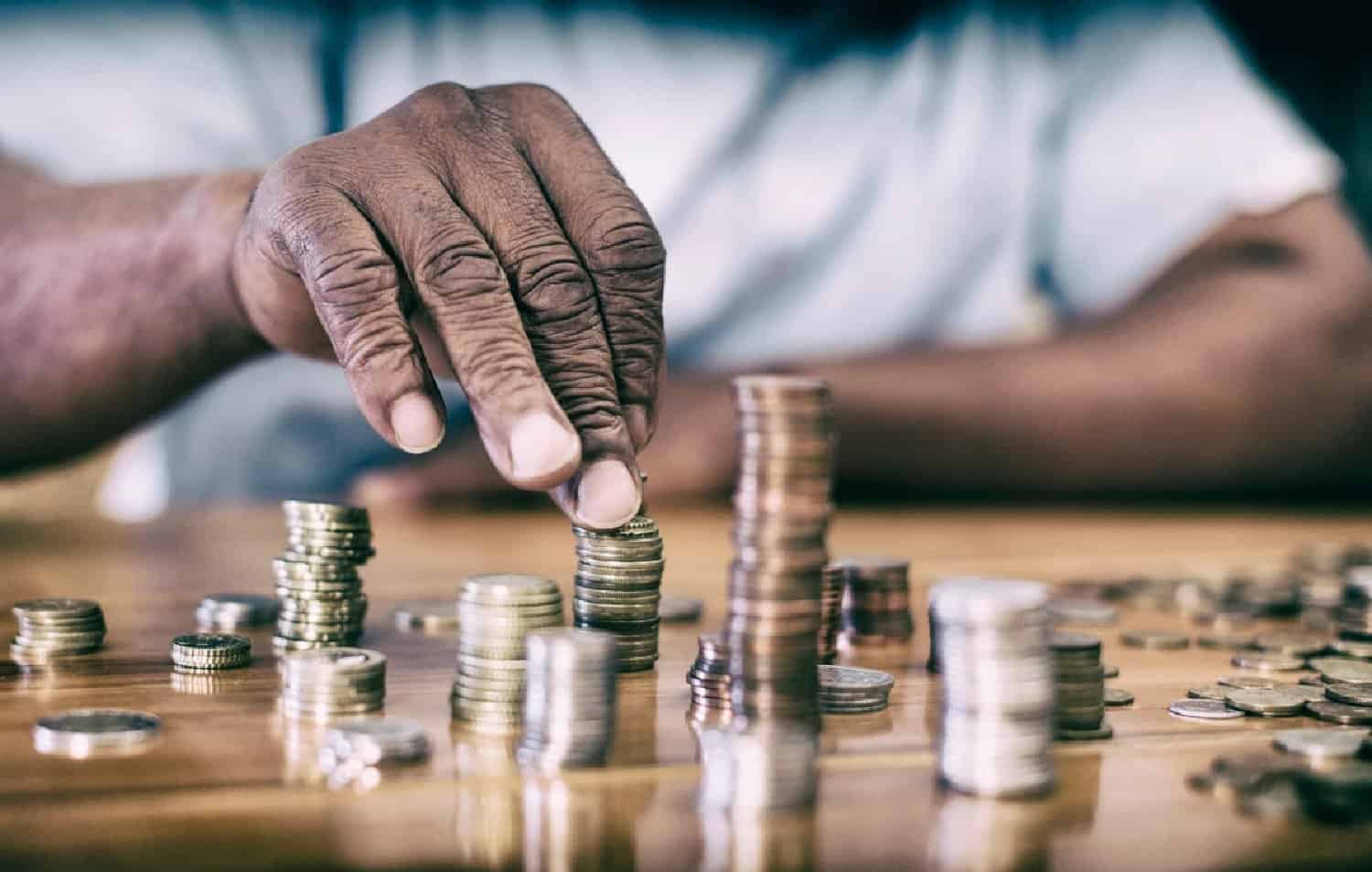 A man counts money.
