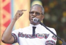 IFP president Velenkosini Hlabisa addresses the crowd at Moses Mabhida Stadium in Durban yesterday. PHOTOS: GALLO IMAGES/AFP