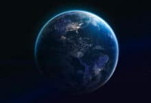 Earth planet at night into the dark. Cities light. Earth in deep space with stars. Planet sphere. Elements of this image furnished by NASA (url: https://eoimages.gsfc.nasa.gov/images/imagerecords/79000/79765/dnb_land_ocean_ice.2012.3600x1800.jpg. Photo: iStock