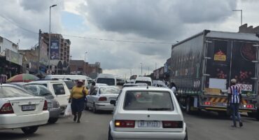 Pietermaritz Street, which has three lanes, is often reduced to a single lane due to the congestion caused by stationary taxis dropping off passengers and trucks offloading goods. Photo: ERIN GUNTER