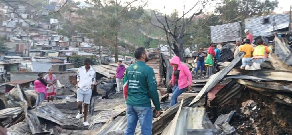 Disaster management teams assess the damage of the fire at the Dakota Informal Settlement. Photo Supplied.