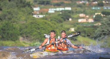 Andy Birkett (front) and partner Matt Fenn in action during the first day of the Dusi race on Thursday. Photo: Dusi Canoe Marathon