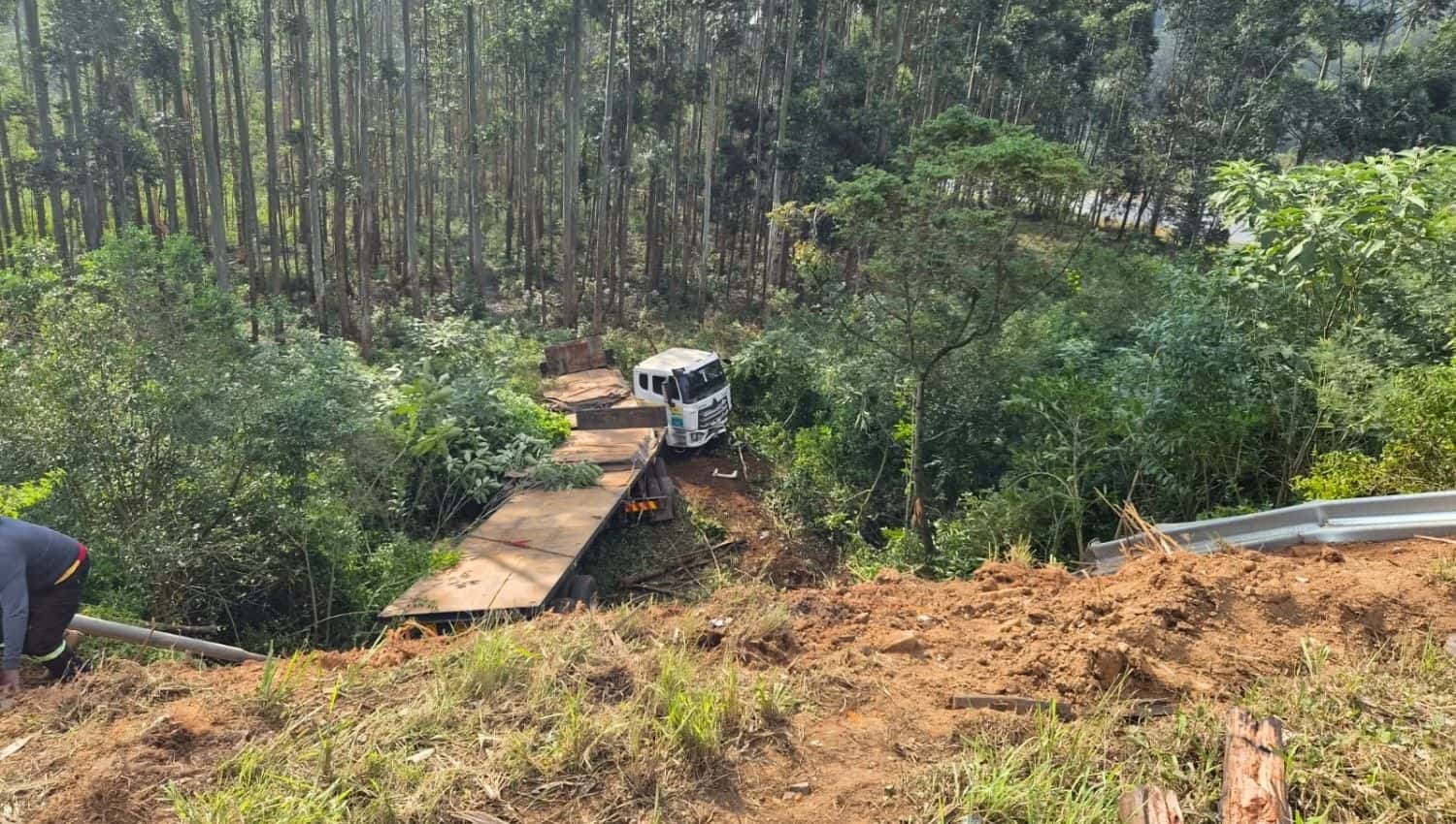 Truck plunges down embankment after losing control at Peter Brown off-ramp
