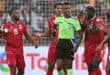 Equatorial Guinea's midfielder #4 Fede Bikoro (2R) speaks with Somali referee Omar Abdulkadir Artan (C) during the Africa Cup of Nations (CAN) 2024 round of 16 football match between Equatorial Guinea and Guinea at the Alassane Ouattara Stadium in Ebimpe, Abidjan, on January 28, 2024.