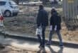 Graphic content / Crime scene investigators walk near a body of a victim laying in the road at Jumpers informal settlement in Cleveland, east of Johannesburg, on June 10, 2026.