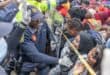 A file image of members Members of the South African Police Service (SAPS) prevent a stampede at Sherwood Park in Durban on June 13, 2026 as more than 7,000 people, mostly Malawian women nationals, queued for repatriation to Malawi. Photo: Rajesh JANTILAL / AFP