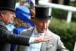 Britain's King Charles III talks with Francis Brooke on the fifth day of the Royal Ascot horse racing meeting in Ascot, west of London, on June 20, 2026. (Photo by Henry Nicholls / AFP)