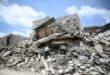 A man walks on the rubbles as he looks for items in a building hit in earlier Israeli military strikes on a neighbourhood in the southern Lebanese coastal city of Tyre on June 23, 2026.