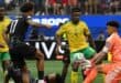 TOPSHOT - South Africa's goalkeeper #01 Ronwen Williams makes a save past Canada's midfielder #17 Tajon Buchanan during the 2026 World Cup round of 32 football match between South Africa and Canada at the Los Angeles Stadium in Inglewood on June 28, 2026. (Photo by Patrick T. Fallon / AFP)