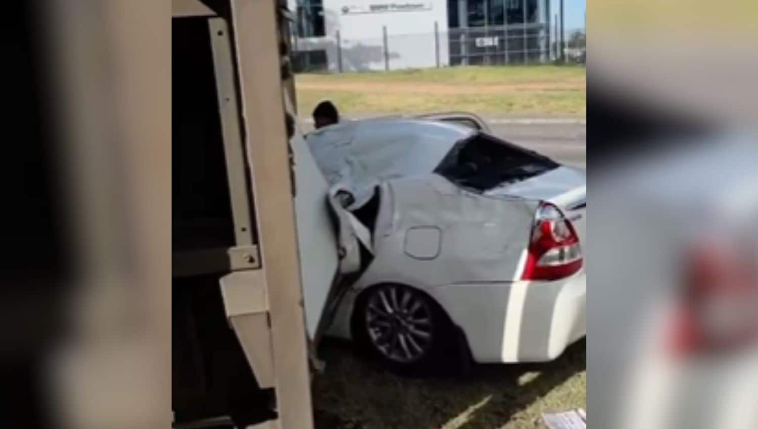 WATCH | Driver survives after truck overturns onto car