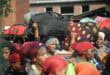 Displaced Malawian nationals carry bags, suitcases and personal belongings on their heads and shoulders as they make their way to waiting buses at a temporary shelter in Pietermaritzburg. The relocation forms part of efforts to ease overcrowding and address the growing humanitarian crisis affecting more than 2,000 people housed at the shelter. PHOTO: MOEKETSI MAMANE