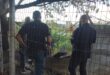 Private security members stand at the scene where a deceased man was found. Photo: Moeketsi Mamane