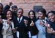 The youth holding the new R2 coin which commemorates 50 years since the 1976 Youth Uprising. Photo: GCIS