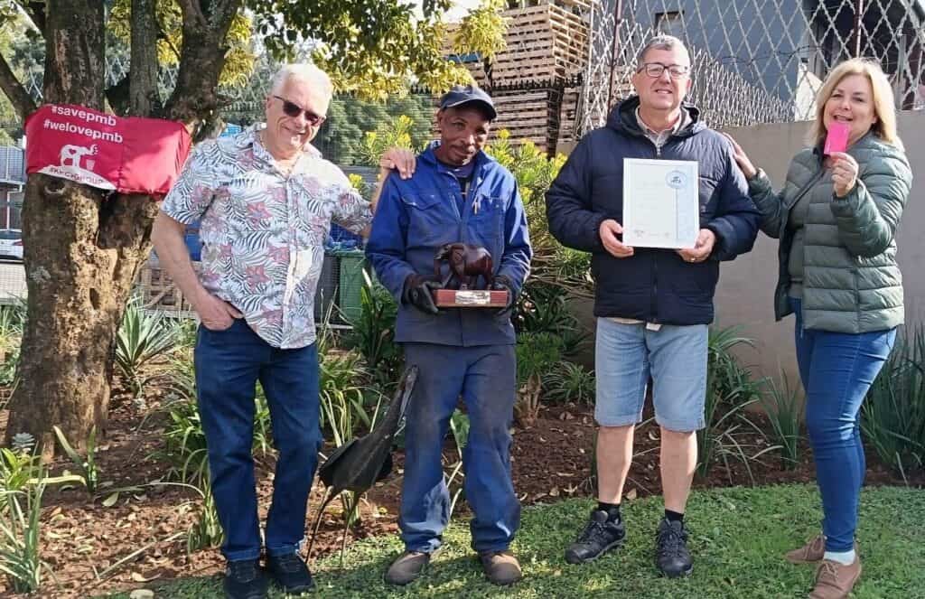 Scrap & Steel earned a Silver Ellie Award for transforming a challenging area into an attractive green space. From left: Glenn McArthur (KPCA Group), Alfred Ndlovu, Carlos Baeta (Scrap & Steel), Lara Edmonds (KPCA Group). Photo: Burkhard Schlosser.
