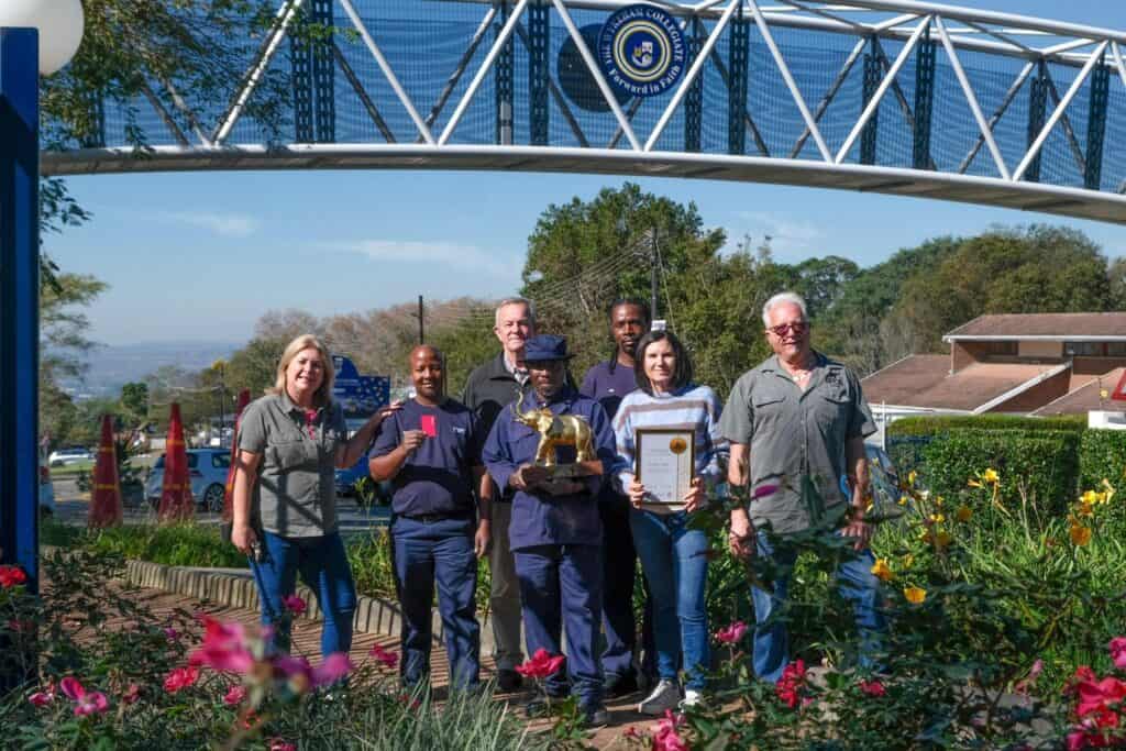 The Wykeham Collegiate received second place in the Education category, with judges praising its colourful verge garden. Front from left: Lara Edmonds (KPCA Group) Vumelani Khanyile (TWC) Lucky Dlamini (TWC) Colleen Harries (TWC) & Glenn Mc Arthur (TWC). Back row from left: BarryMoig (TWC) and Madonna Maphumulo (TWC) Photo: Burkhard Schlosser.