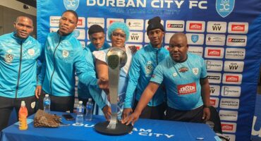 Pictured from left to right at Scottsville Mall during Durban City's Nedbank Cup trophy celebration are second captain Mkhize Mfanafuthi, Lwandile Mbanjwa, Siyanda Ximba, the Queen of Durban City, Samkelo Maseko and Mdu Mbele. The players joined supporters for a memorable celebration as fans gathered to take photographs and celebrate the club's trophy success. Photo: Moeketsi Mamane