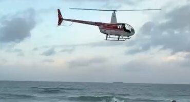 Helicopter searching for the missing man. Photo: Rusa